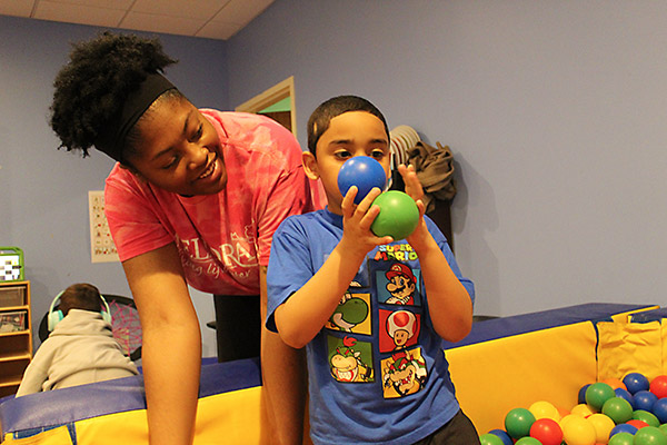 Meliora Academy Student with teacher in sensory lab
